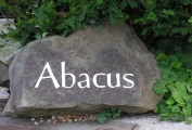 A close-up of the Abacus Bed and Breakfast name stone